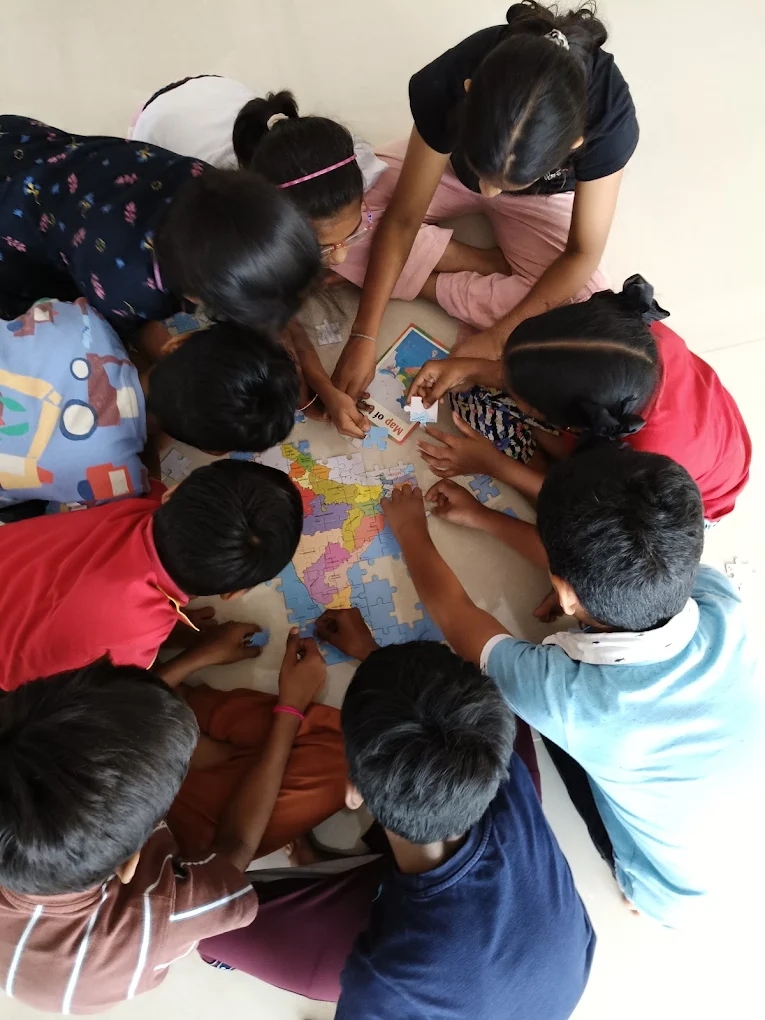 Students solving puzzles together